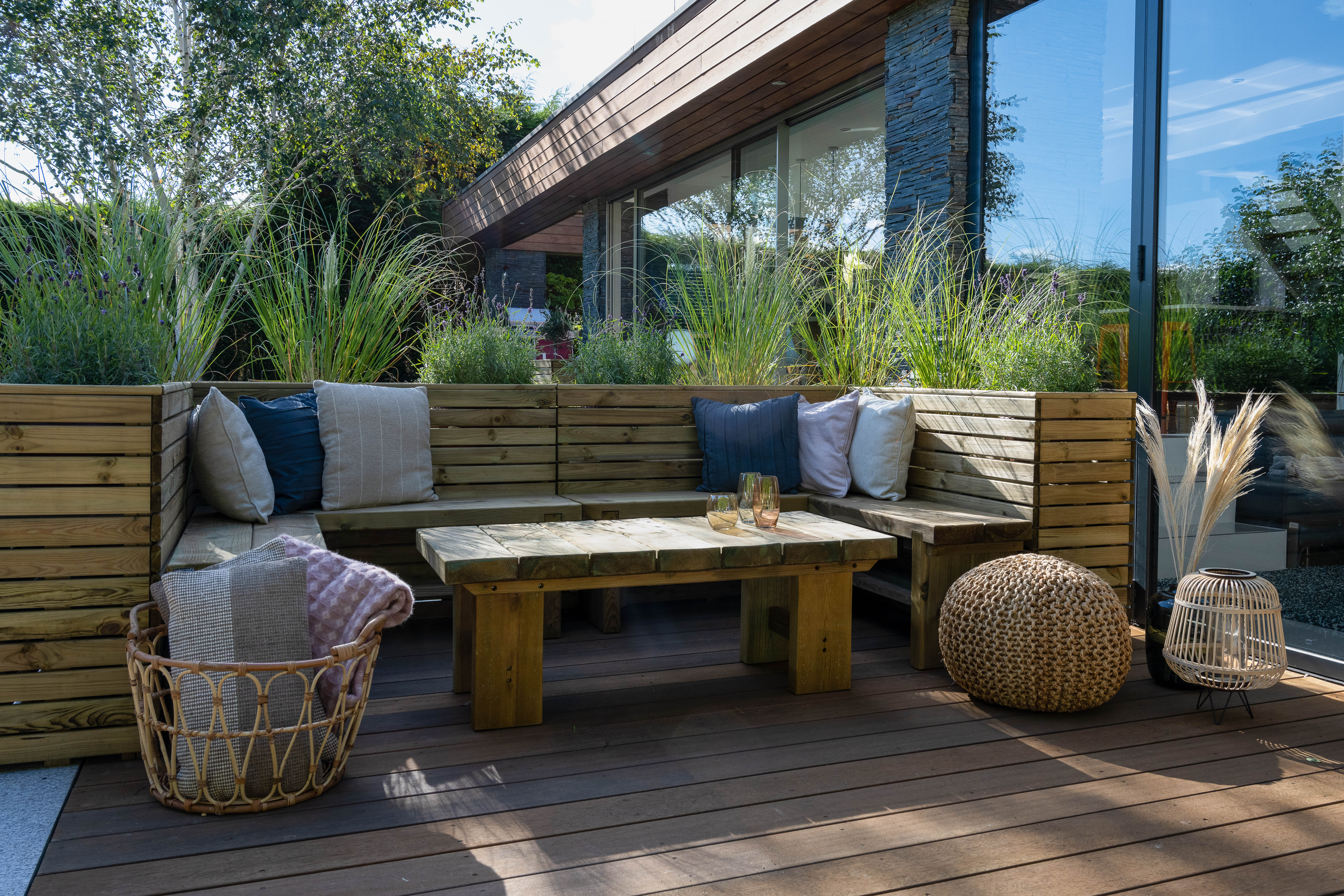 Linear corner planter seating area